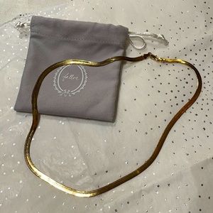 Hailey Fallon herringbone 18” necklace lays comfortably on neck.